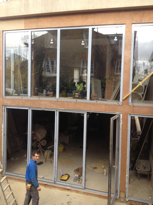 Aluminium bi-fold doors with two-storey glazing in Moorgate